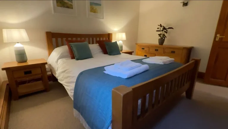 The bedroom in Barn Owl Cottage, Popham Farm Alpaca Trekking