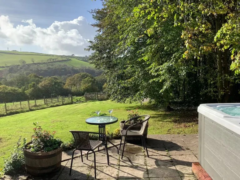Private patio and hot tub at Barn Owl Cottage with great views
